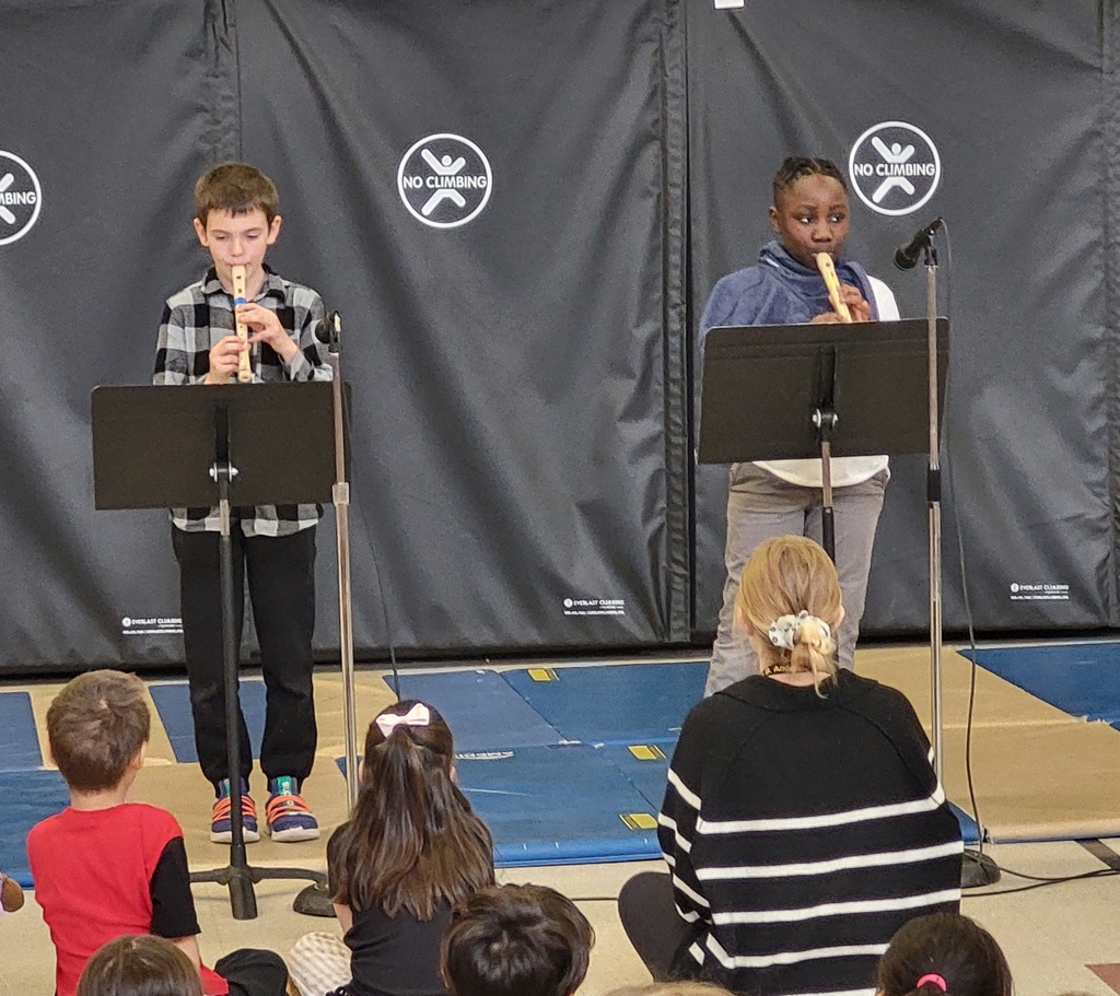 boys playing the recorder