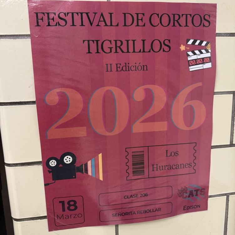 Poster in Spanish reading “Festival de Cortos Tigrillos” with the event date displayed, announcing a student short film festival.
