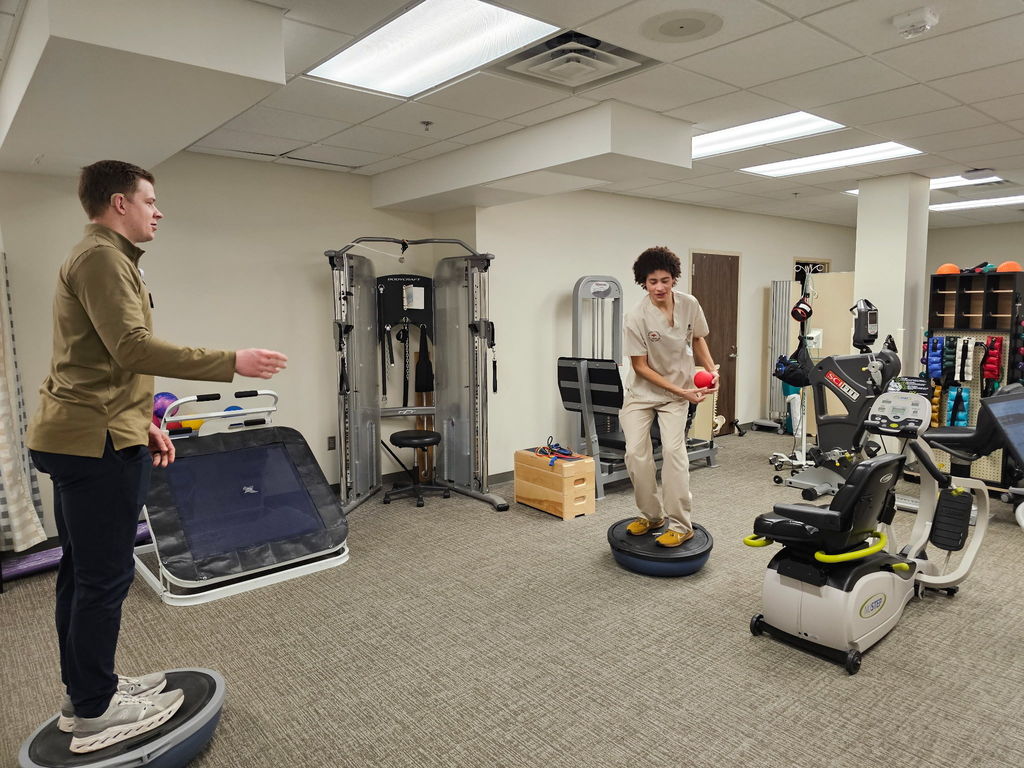 Health Careers student working with Physical Therapy