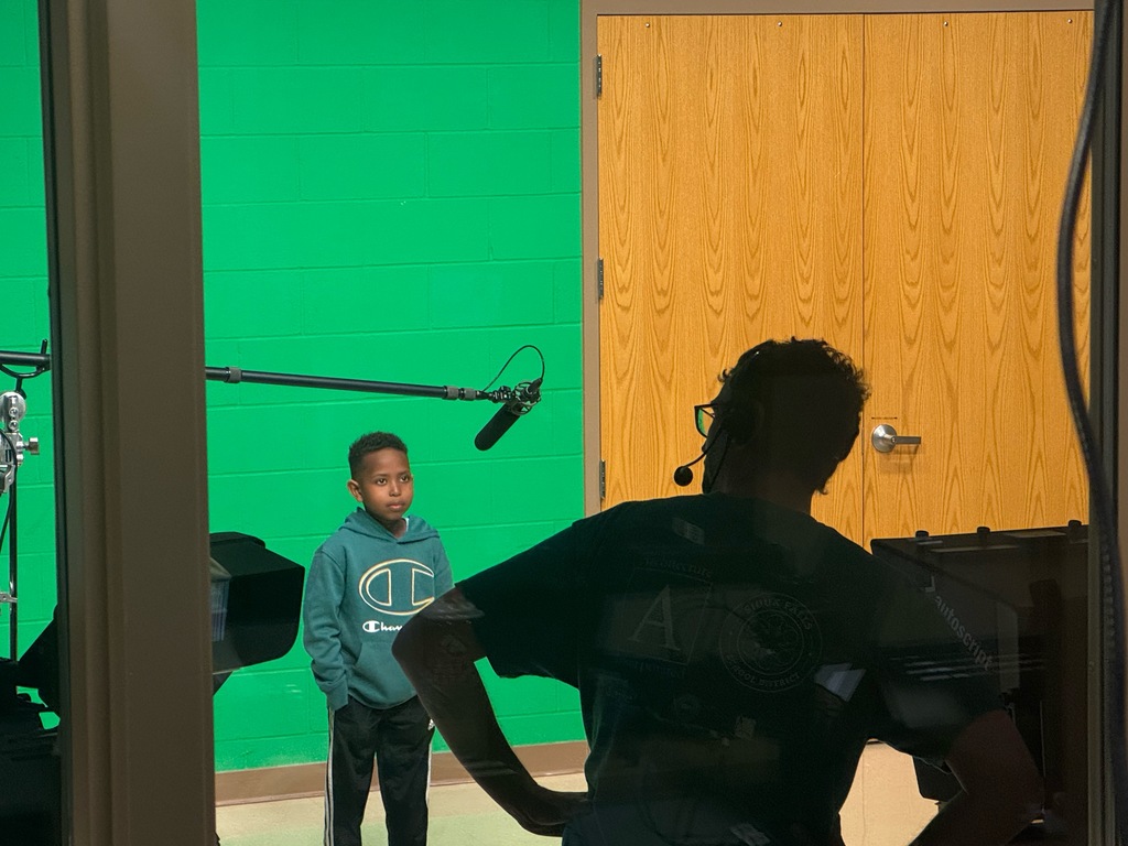 Garfield Elementary students using the green screen for media productions