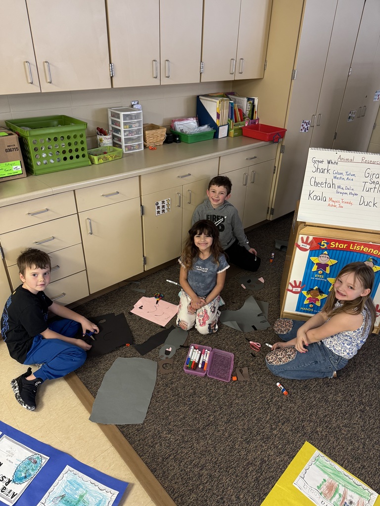 students making animal posters