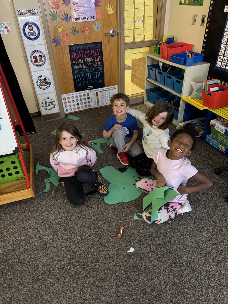 students cutting paper