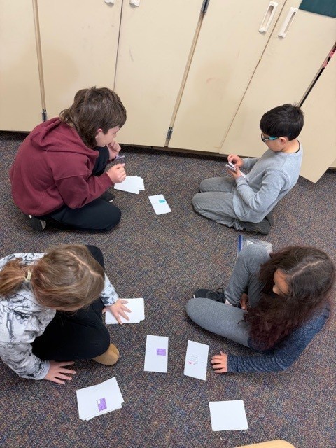 students in 401 playing fraction game