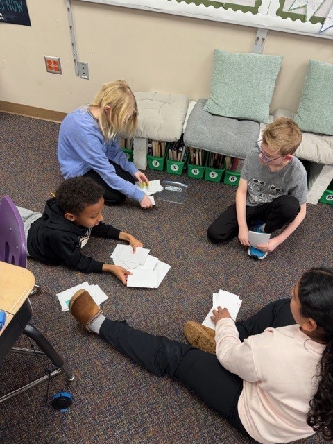 students in 401 playing fraction game
