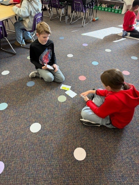students in 401 playing fraction game