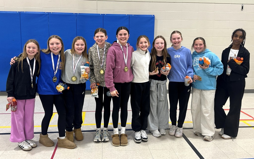 A group of fifth grade girls who won a Book Battle competition.