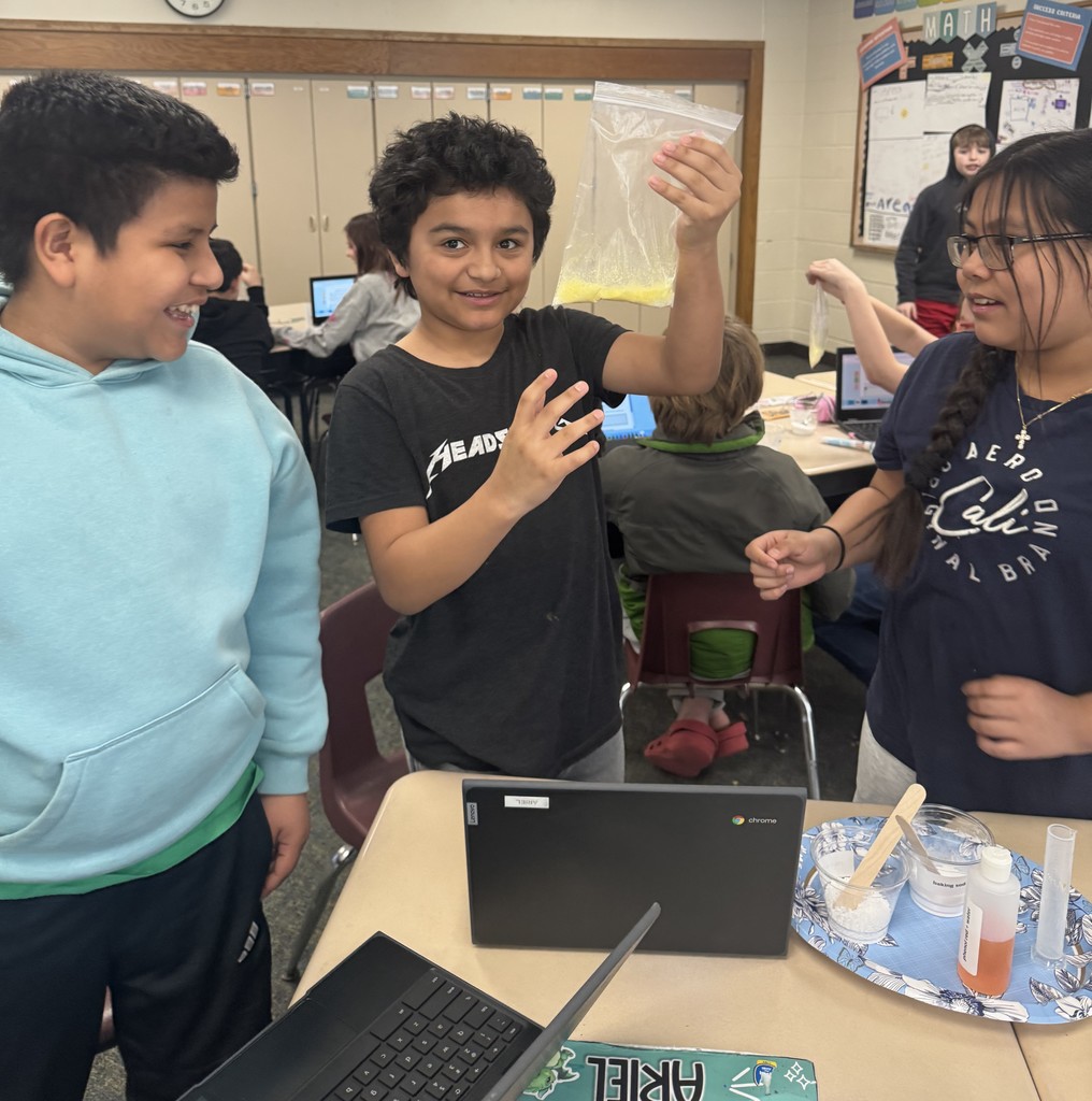 boys and girl doing science