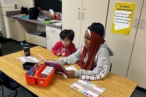 boy and girl reading