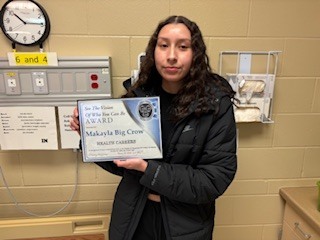 CTE student posing with See the Vision Award
