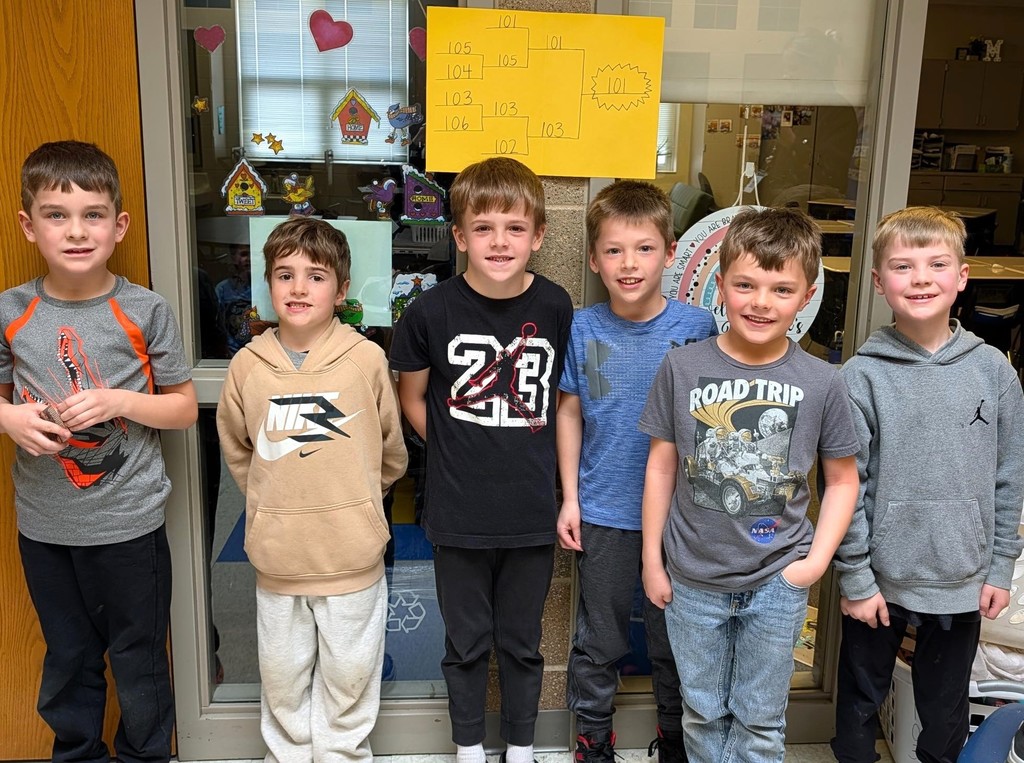 First grade boys standing. 