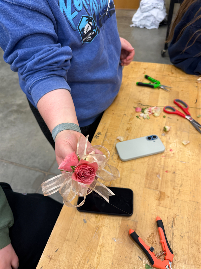Flowers being put together