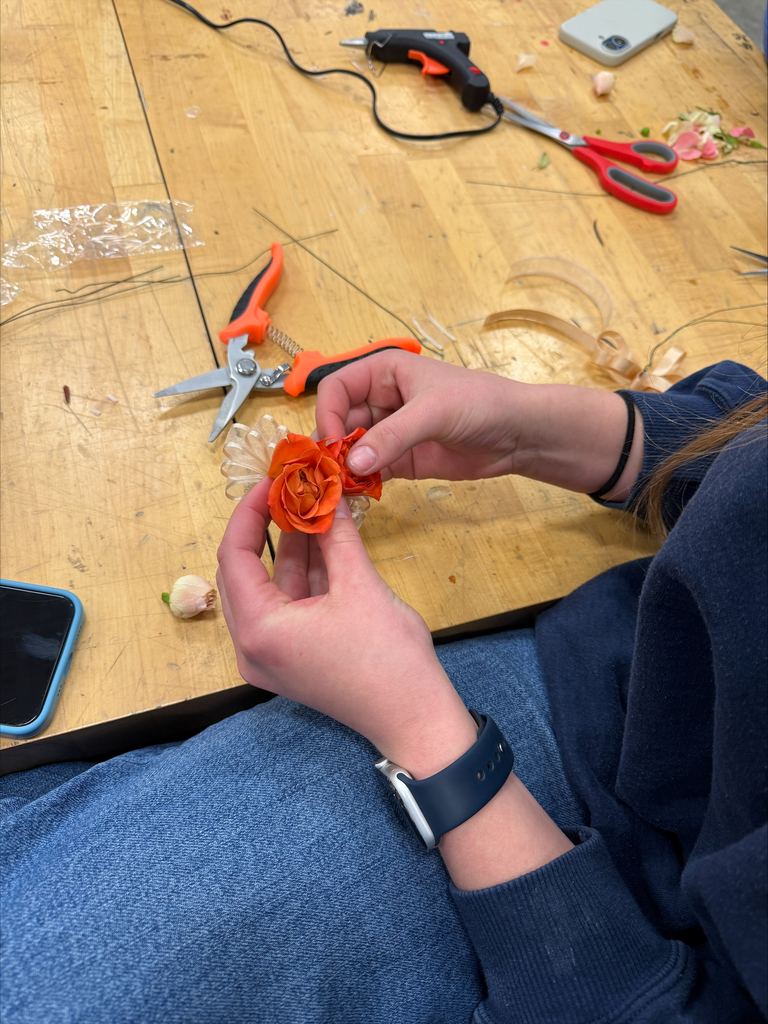 Flowers being put together
