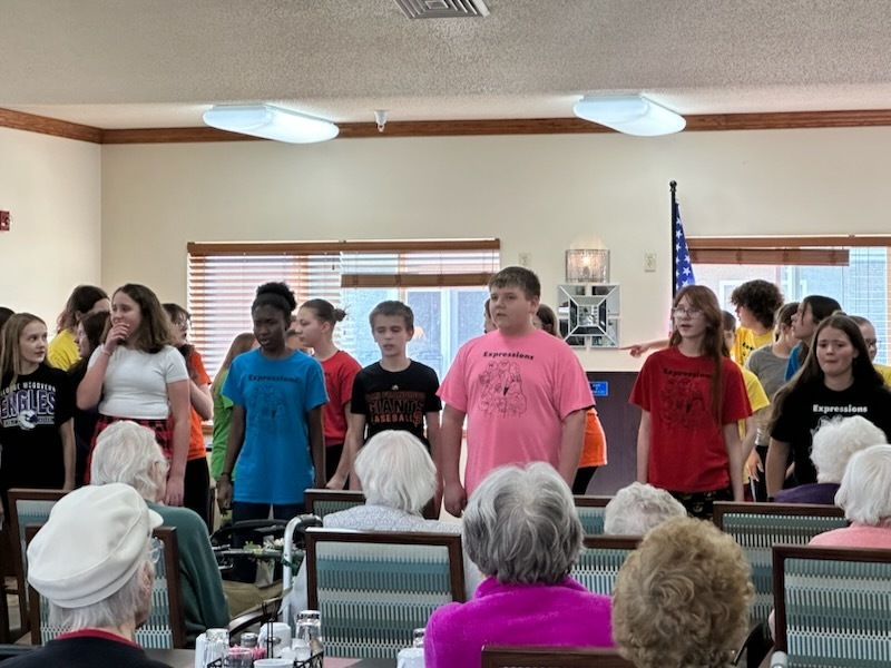 Expressions performing at nursing home. 