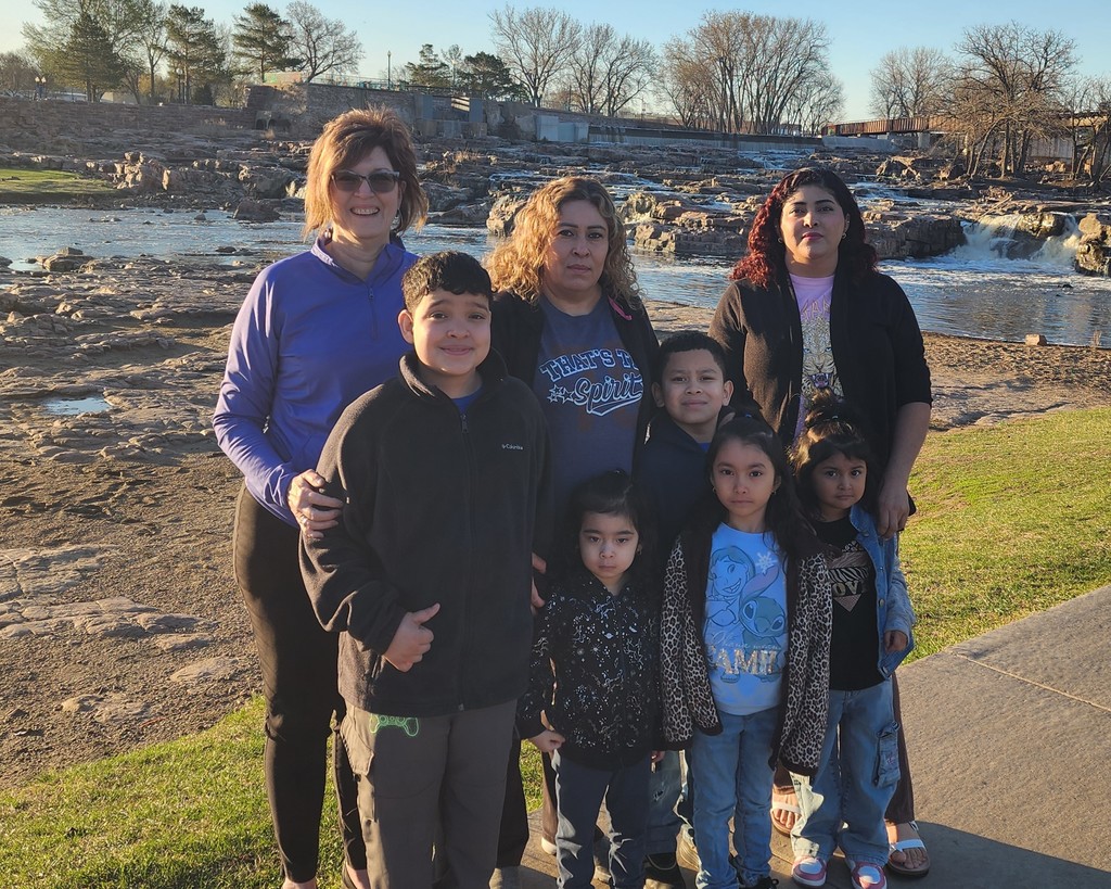 contest winner with family and Citi volunteer