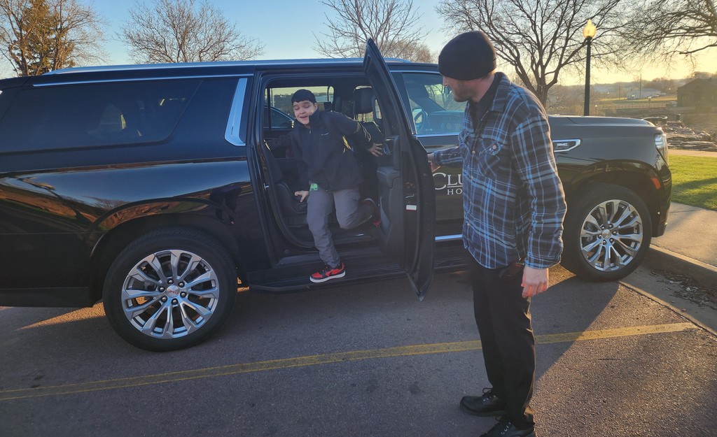 contest winner getting out of the car