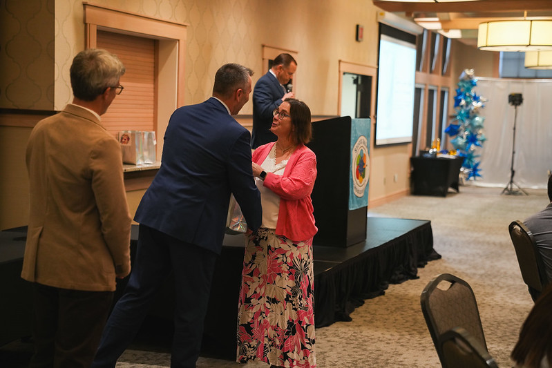Tricia Runyan receiving award