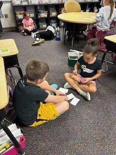students talking about science