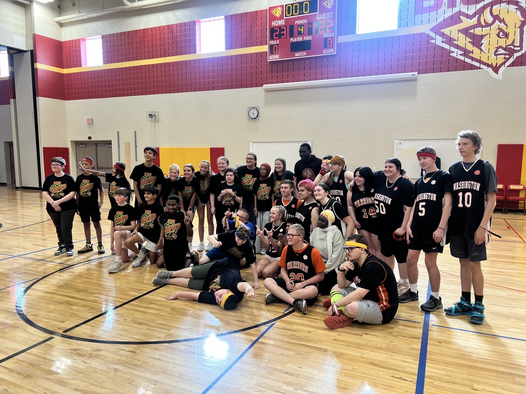 Members of the Ben Reifel Unity team stand alongside members of the Washington High School Best Buddies team after an exciting matchup.
