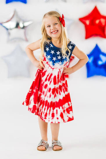 girl in red, white, and blue dress 