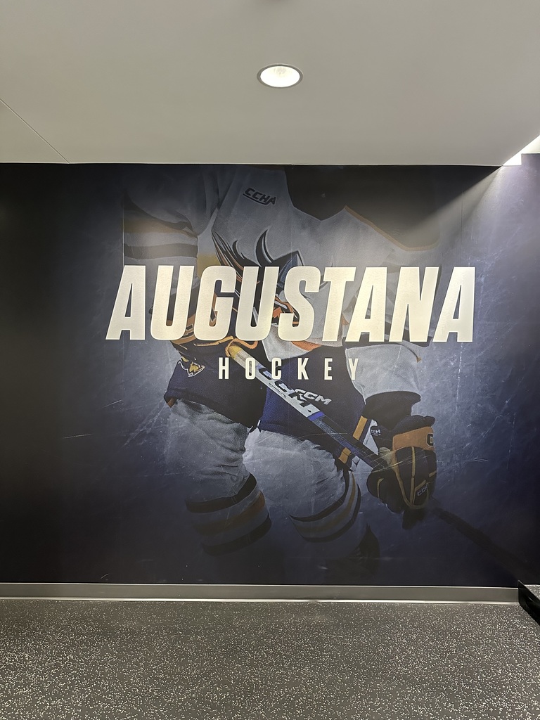Augustana Hockey logo on the wall
