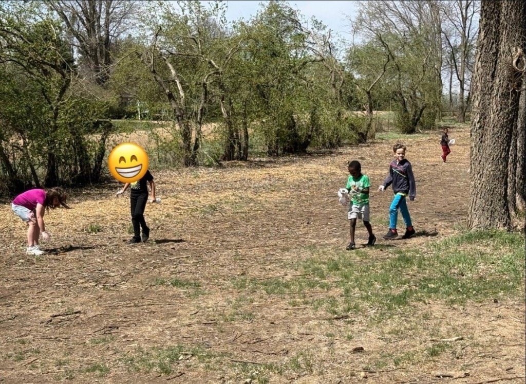 students picking up garbage