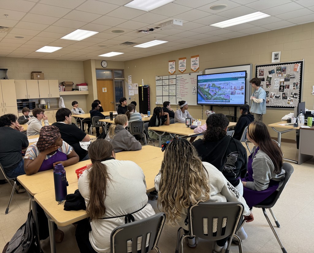 Students listening to a guest speaker