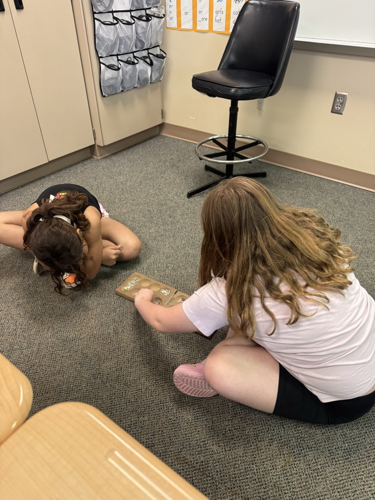 two students playing a game 