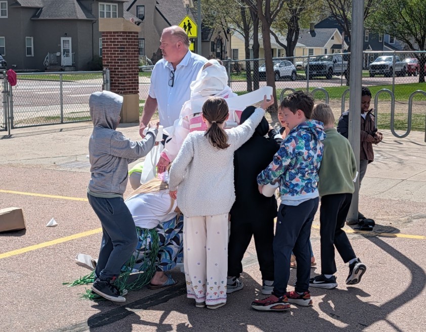 Mrs. Miller being mummified. 