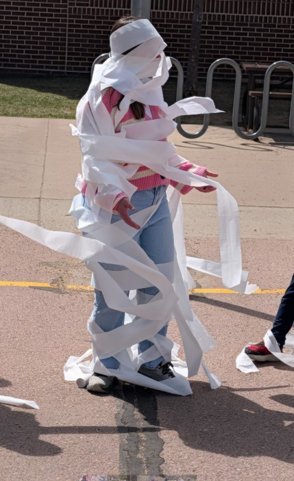 Mrs. Miller being mummified. 