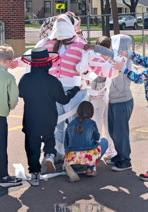 Mrs. Miller being mummified. 