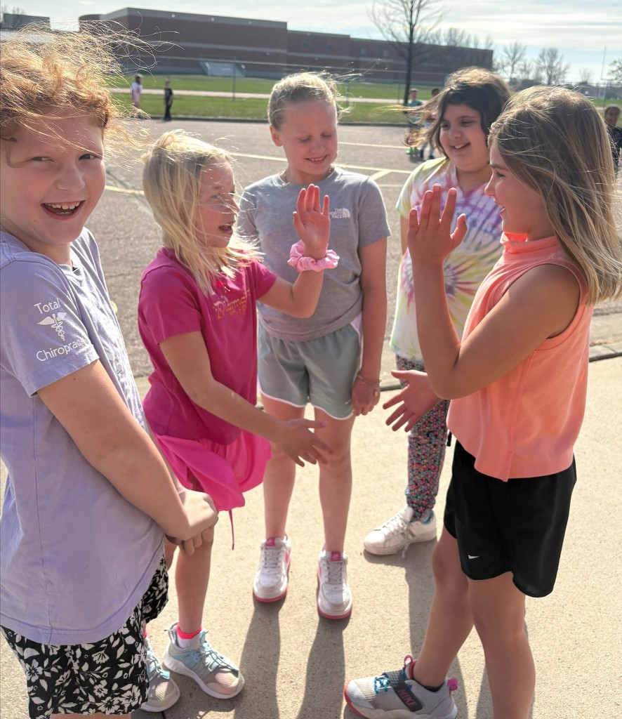 Students running at recess. 