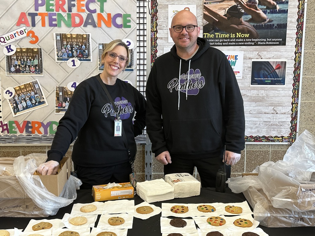 principals serving cookies at the Art Show