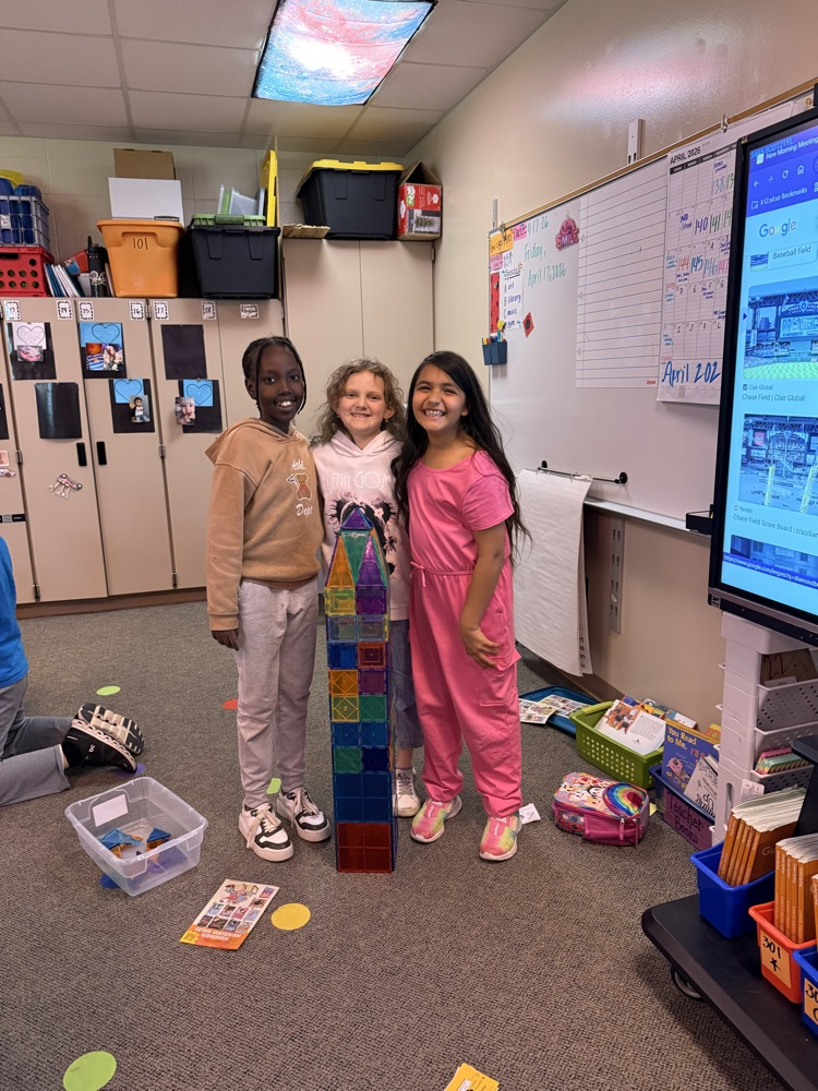 three girls with their magnatile creation
