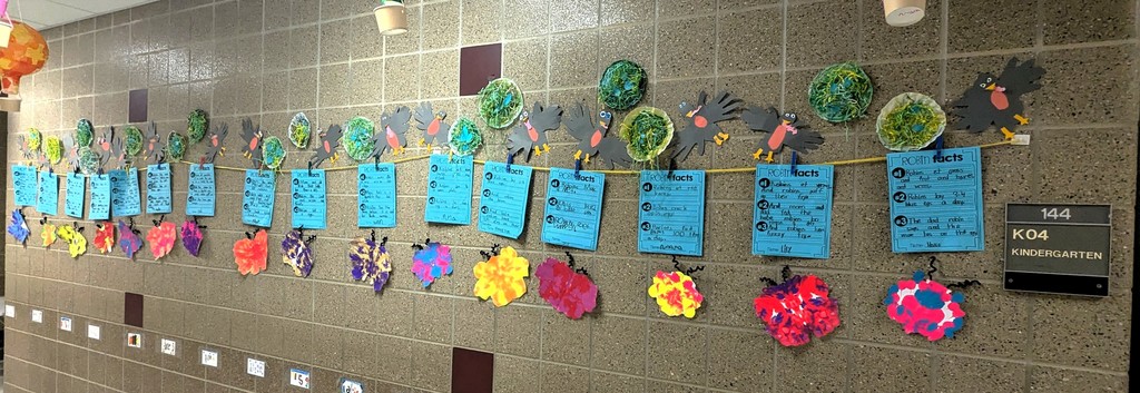 Kids artwork about robins and butterflies. 