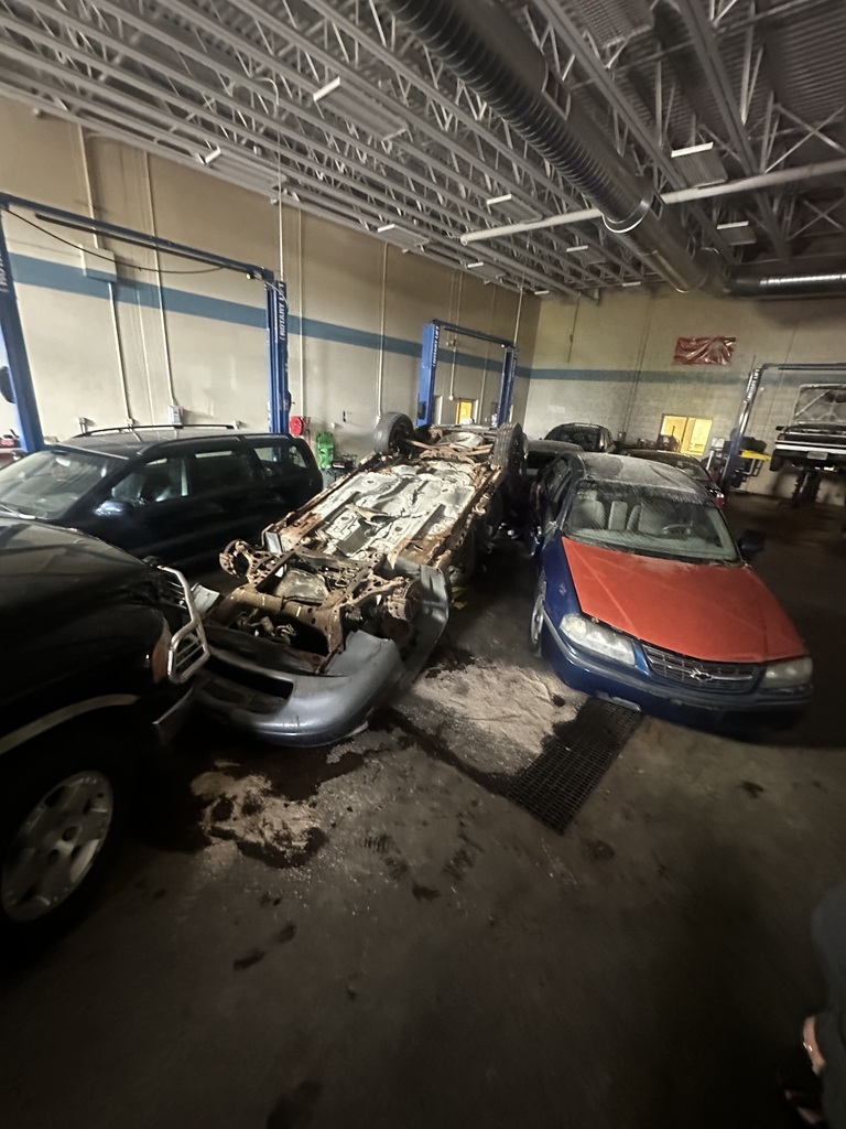 AutoTech lab with vehicles piled up for simulation