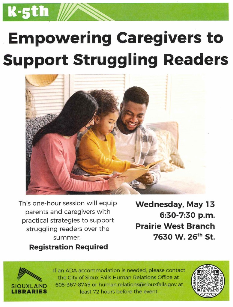 A FAMILY OF THREE READING TOGETHER. ON A SOFA, SMILING