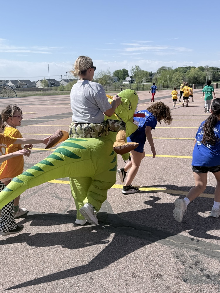 staff member and students at the Fun Run 