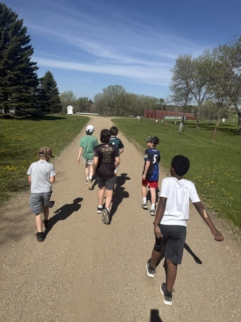 group of boys walking down the path