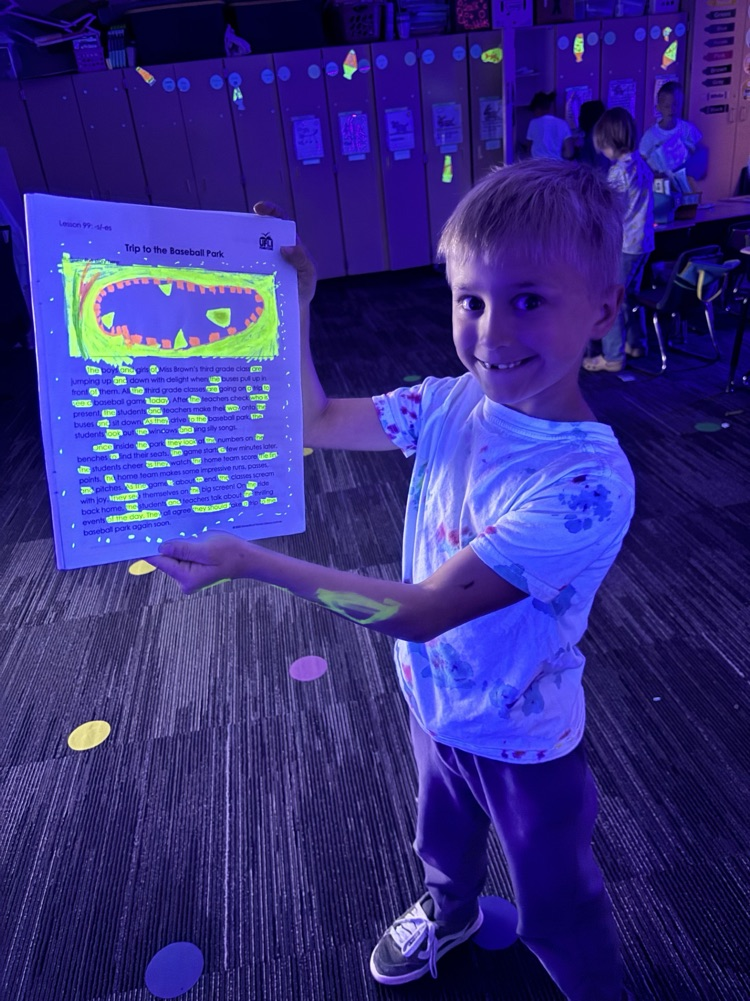 a student showing off his glow story