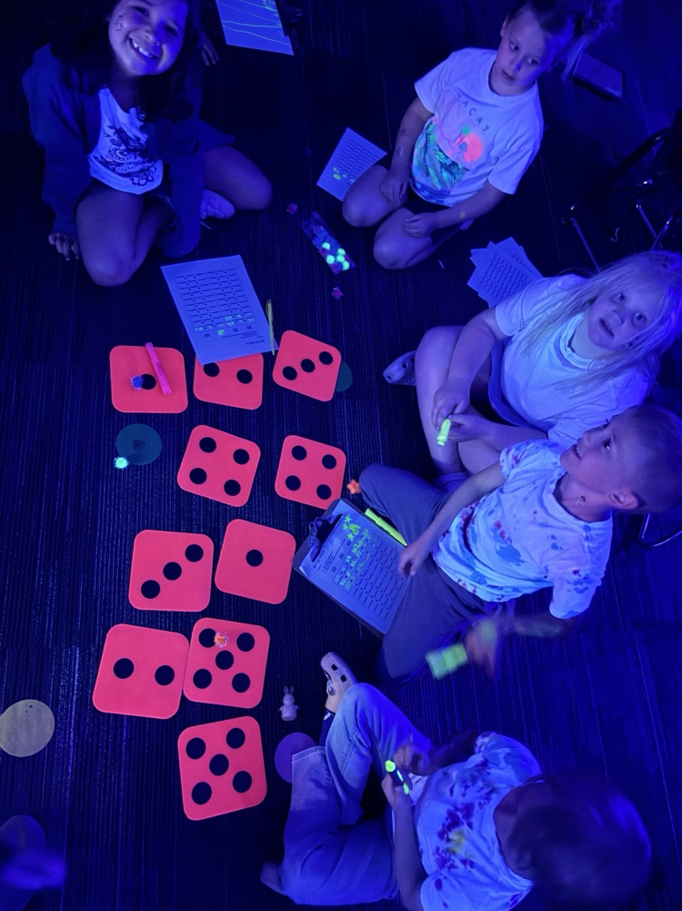 students playing a glow game