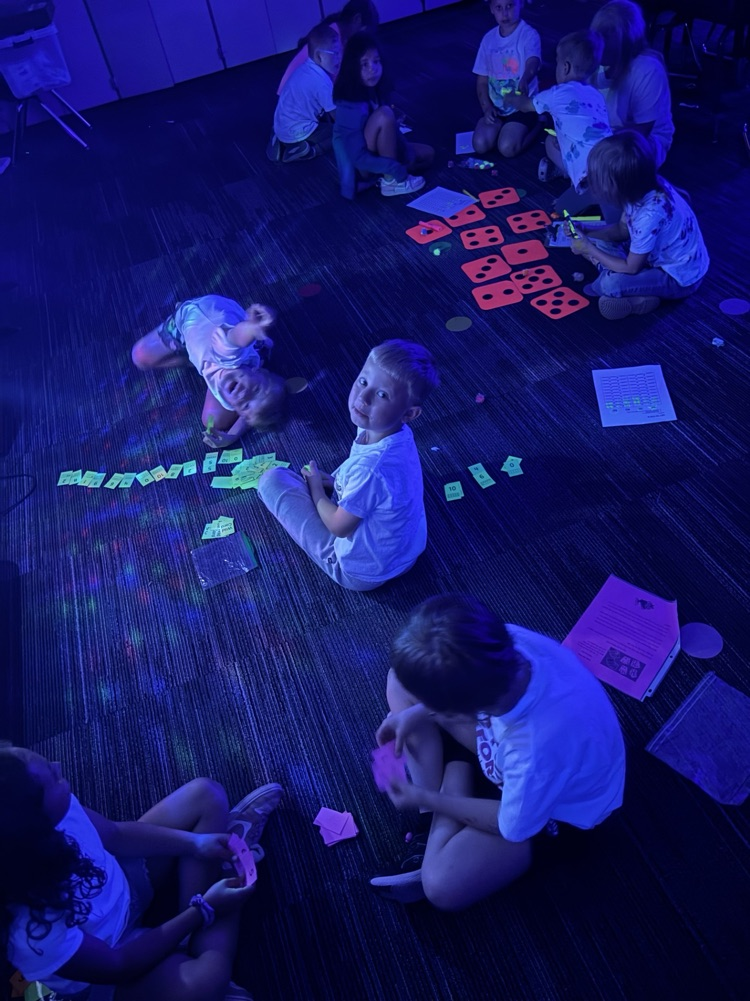 students playing a glow game