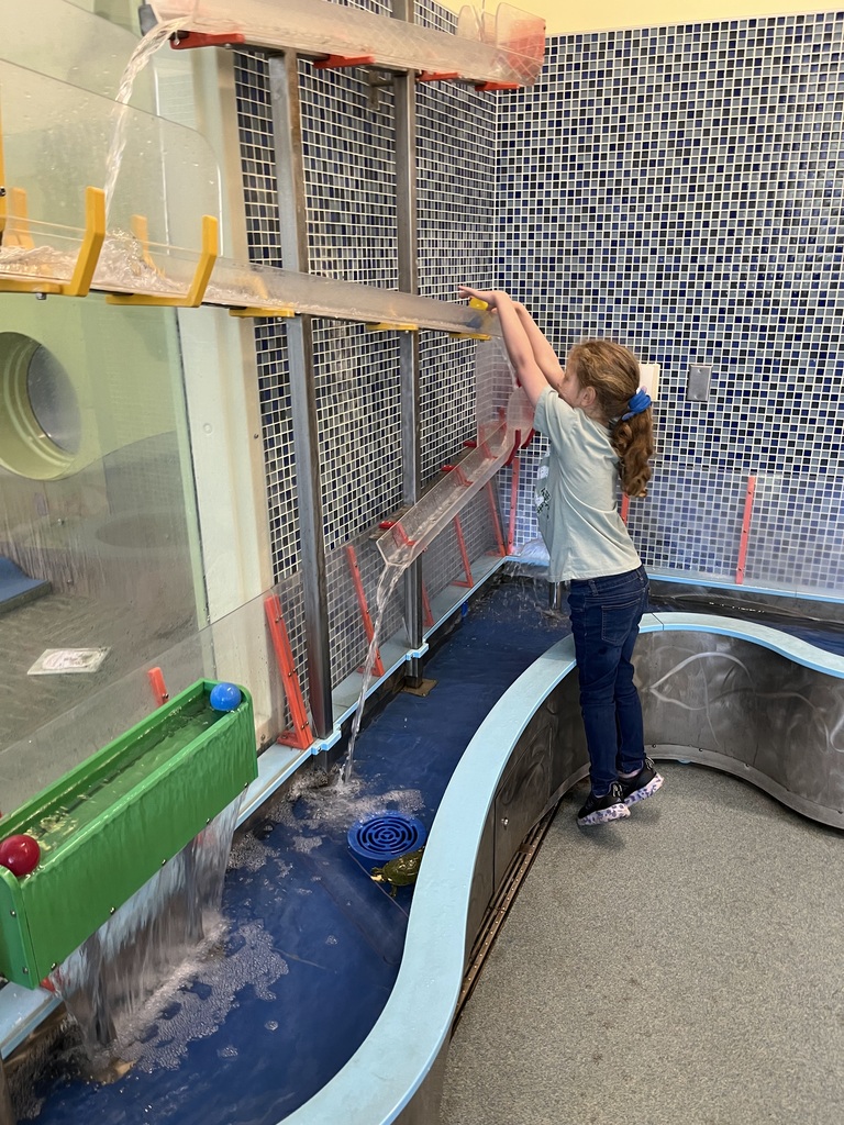 girl playing in water