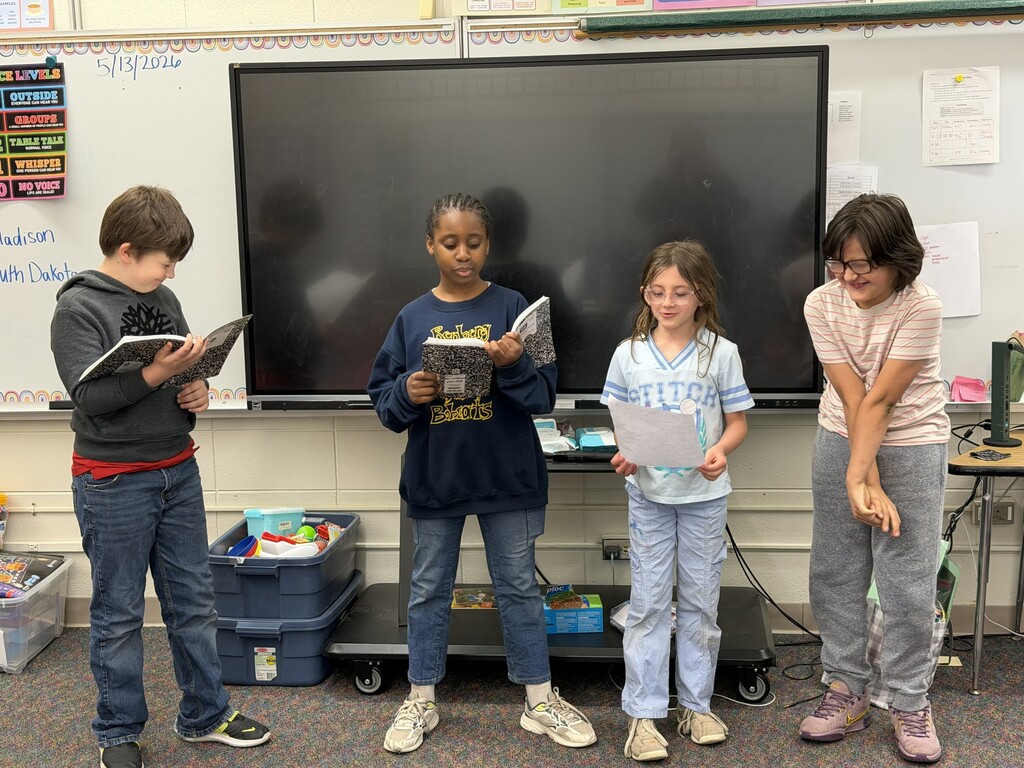 4 students reading a play