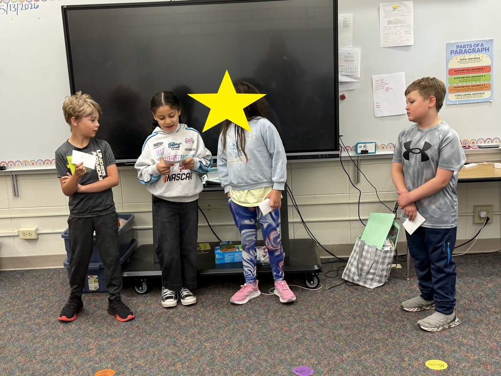 4 students reading a play