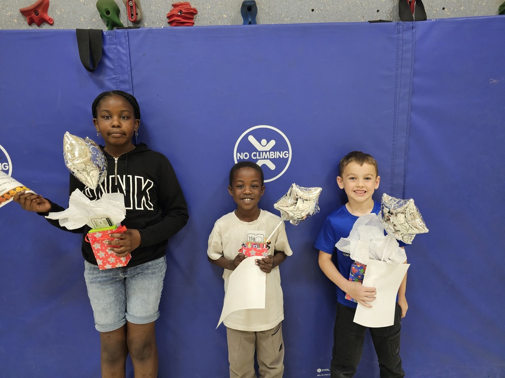 3 students standing with perfect attendance