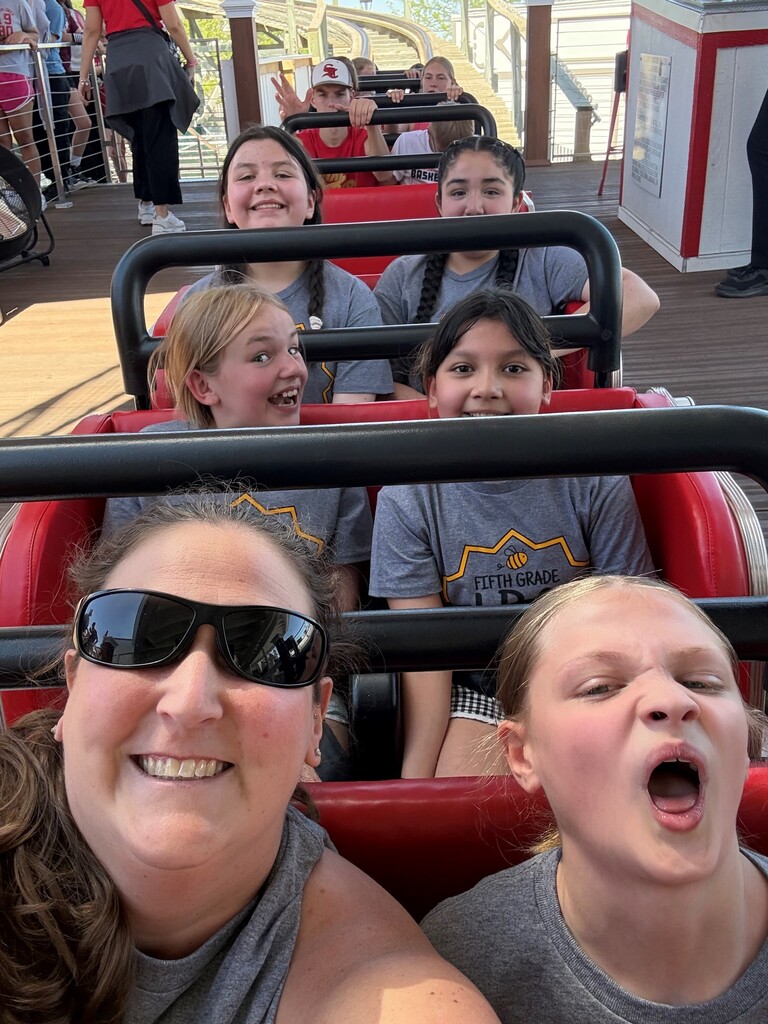 people on a roller coaster