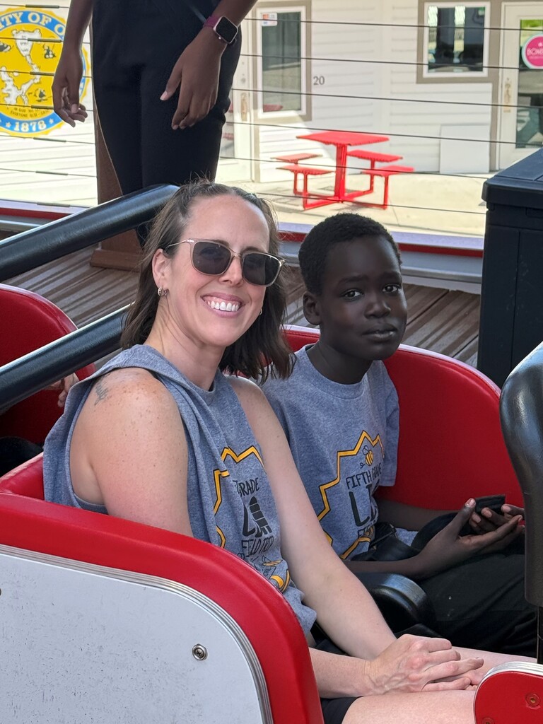 people on a roller coaster
