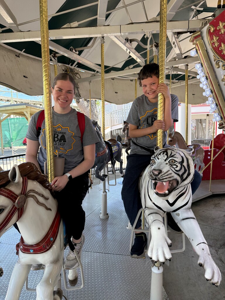 people on a merry go round
