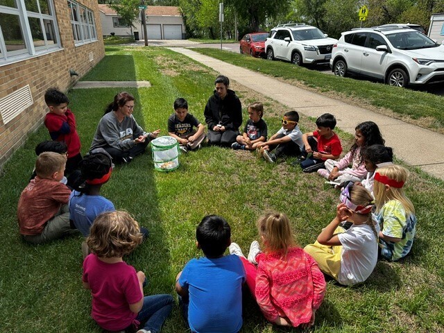 students sitting in a circle