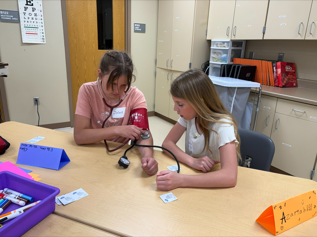 Students practicing blood pressure